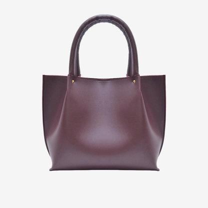 leather tote bag maroon with grey background
